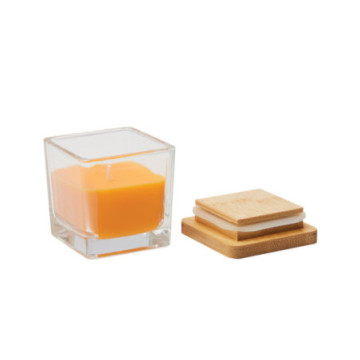 Bougie parfumée orange en verre avec couvercle en bambou