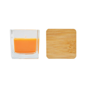 Bougie parfumée orange en verre avec couvercle en bambou